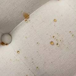 Round Ivory Cepheus Tufted Ottoman