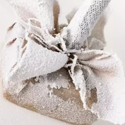 4ft. Flocked Pine Christmas Tree in Burlap Sack