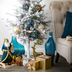 4ft. Flocked Pine Christmas Tree in Burlap Sack